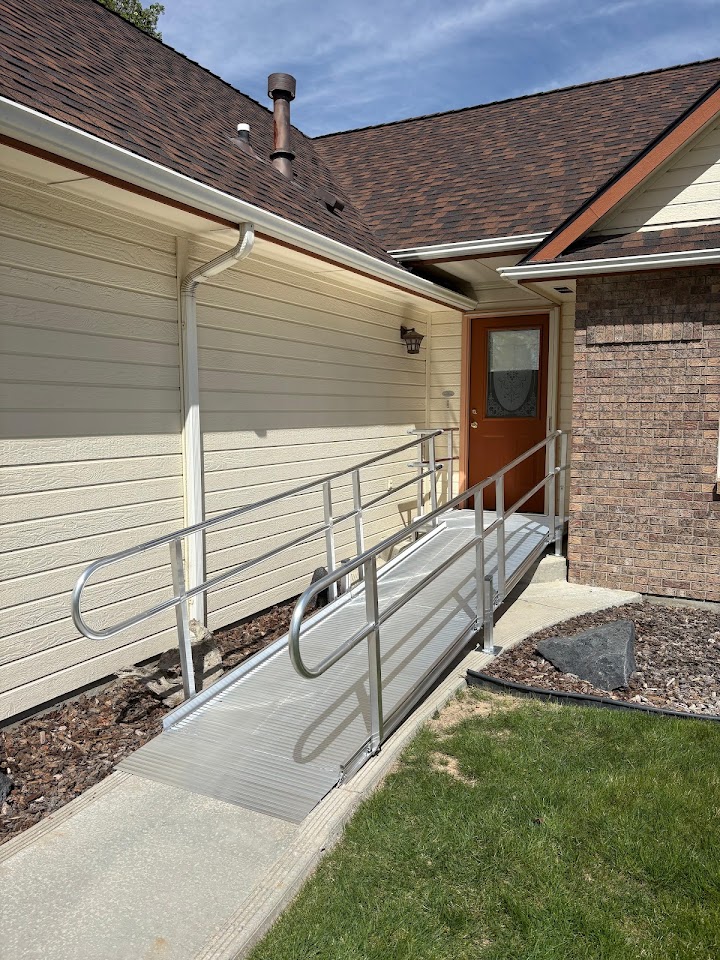 Modular aluminum ramp installed at a home entrance