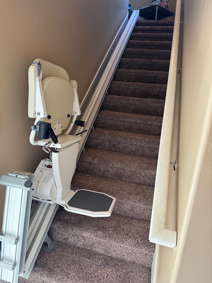 Straight stairlift installed on a staircase